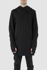 Leon Louis - Front view of black cotton bulk hood sweater with thumbhole details, kangaroo pockets, men's Permanent Collection.