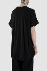 Leon Louis - back side view of black Pryo Tencel tee with oversized fit, silky texture, men's Permanent Collection.