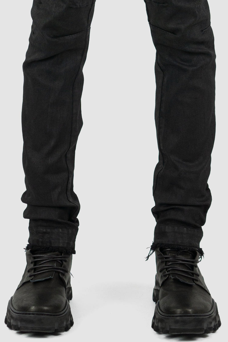 Leon Louis - hem view of black waxed Xeon shaped line denim jeans, slim fit, men's Permanent Collection.