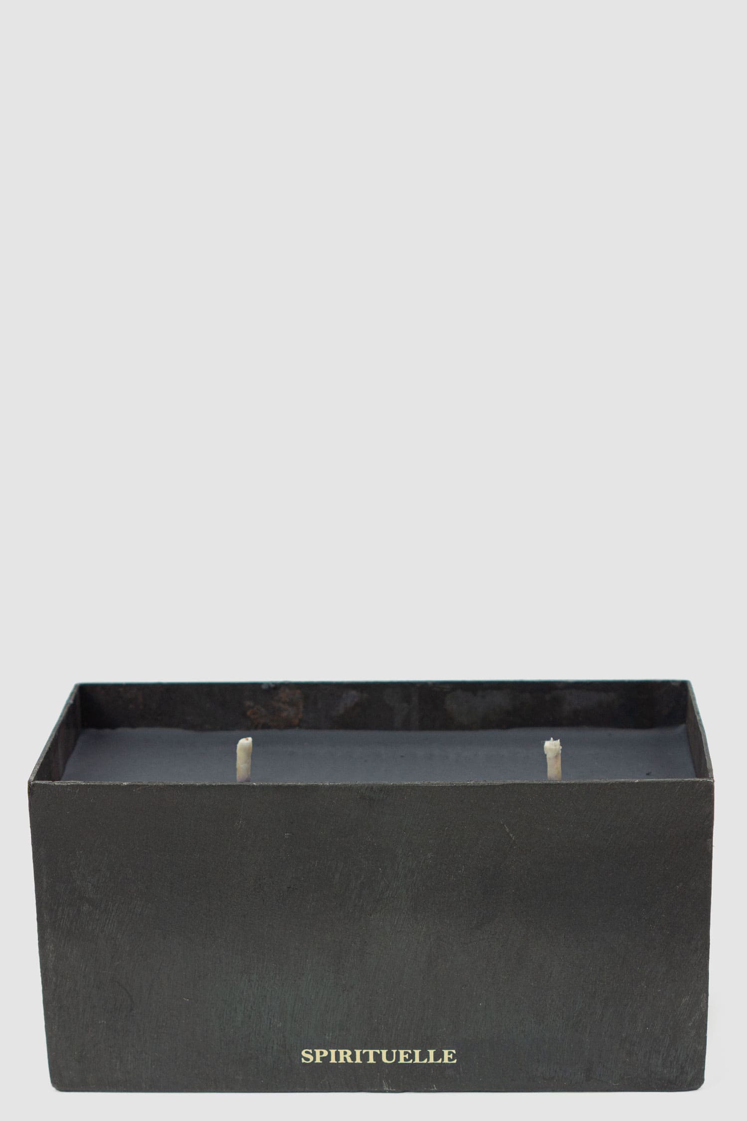 Mad et Len - front view of Spirituelle Scent Black Block Candle from the Permanent Collection with Burned Black Heavy Iron Vessel.