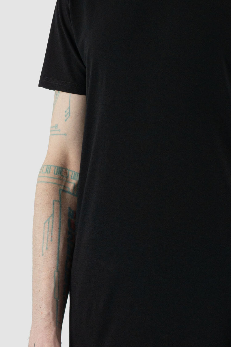 Nomen Nescio - arm detail view of black basic T-shirt, breathable and soft on skin, round neckline.