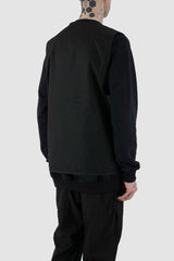 Nomen Nescio - back side view of black cotton field vest with multiple pockets, zip fastening, loose fit.