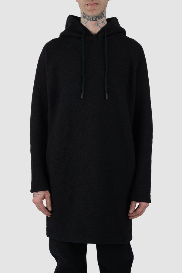 Nomen Nescio - front view of black long wool sweater 520 for men from the FW24 collection features a relaxed, oversized fit with raglan shoulders for a contemporary look.