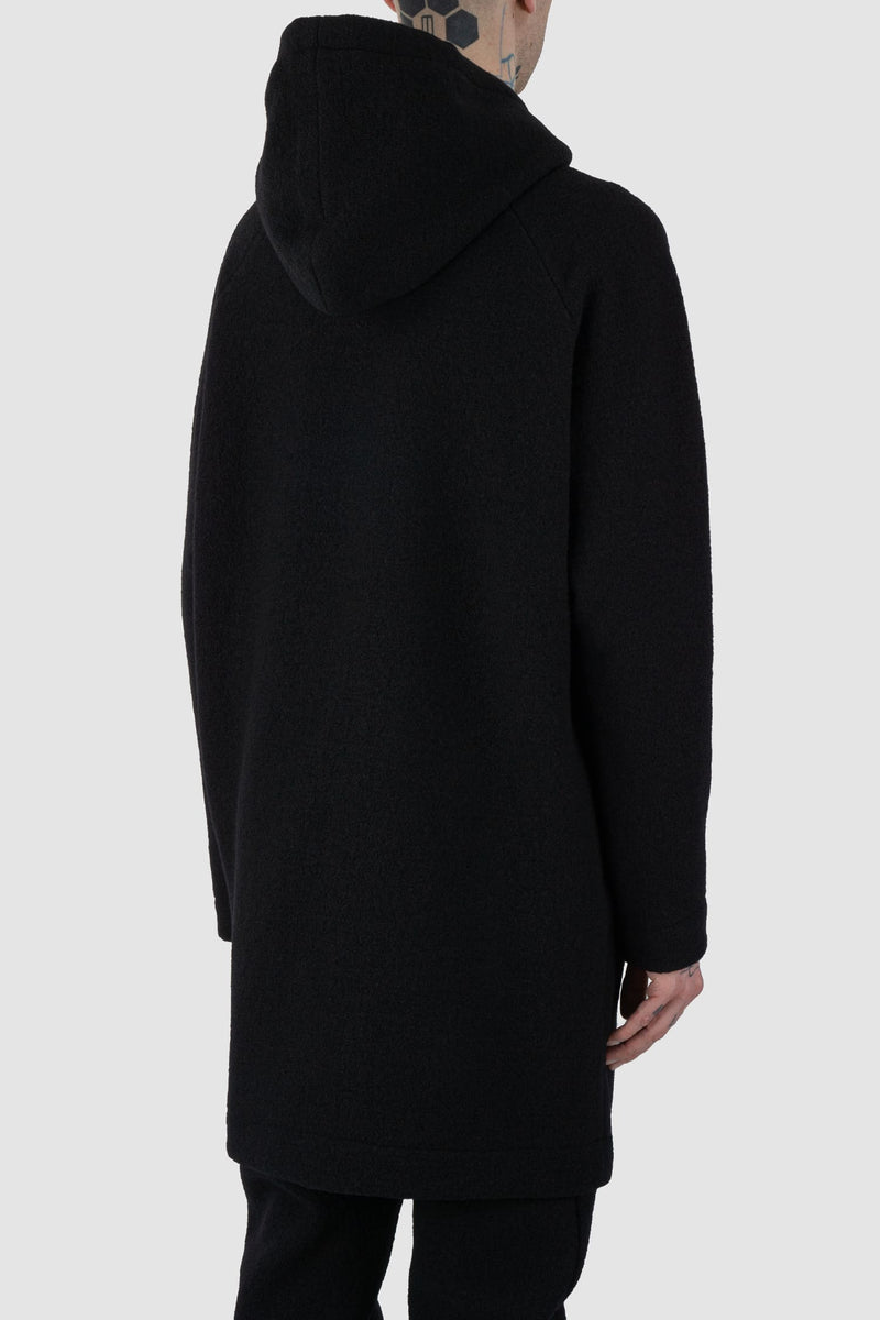 Nomen Nescio - back side view of black long wool sweater 520 for men from the FW24 collection features a relaxed, oversized fit with raglan shoulders for a contemporary look.