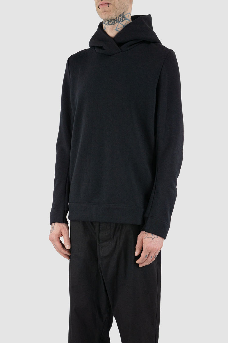 Nomen Nescio - side view of black wool hoodie.