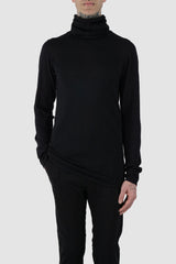 Nomen Nescio - front relaxed view of black merino wool turtleneck sweater 505 for men from the FW24 collection is crafted from 100% fine merino wool and features mulesing-free yarn.