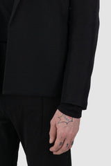 Nomen Nescio - front arm view of black open basic blazer jacket 303 for men from the FW24 collection features a minimalist, straight, and slightly tailored cut.