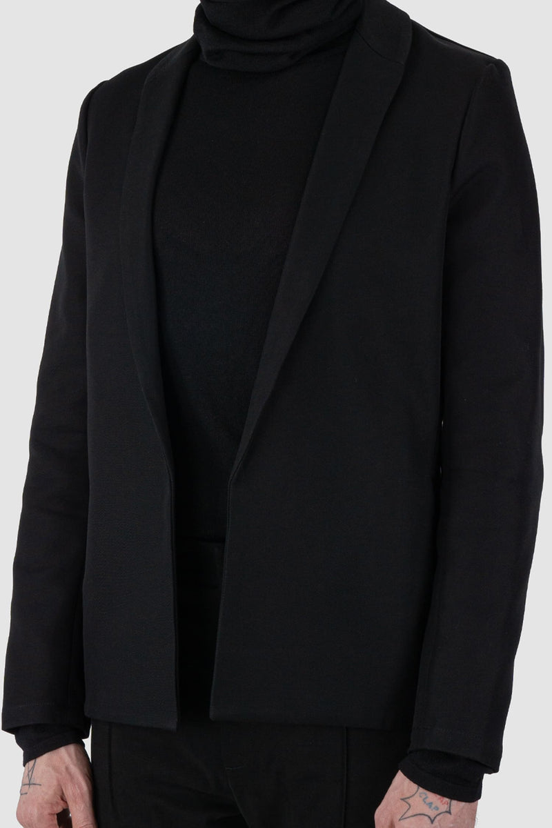 Nomen Nescio - front detail view of black open basic blazer jacket 303 for men from the FW24 collection features a minimalist, straight, and slightly tailored cut.