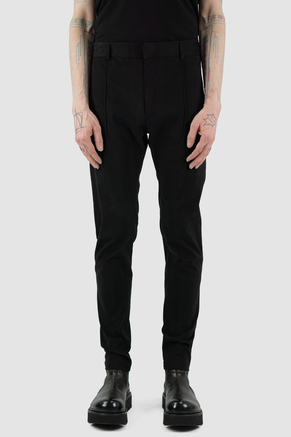 Nomen Nescio - Front view of black cotton blend slim trousers with slanted front pockets, zip-fly fastening.