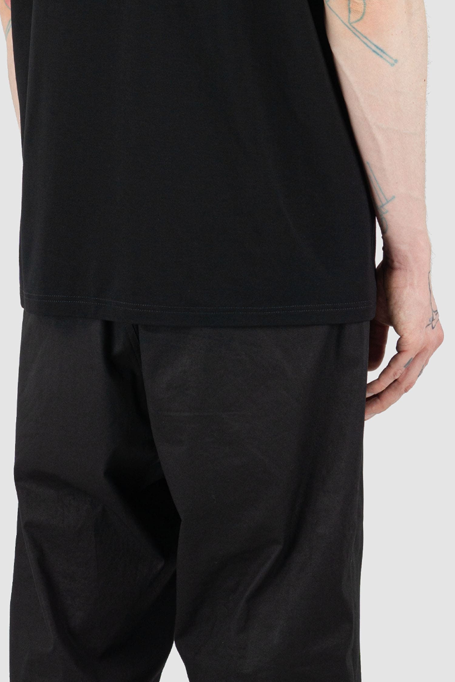 Nomen Nescio - back detail view of black standard T-shirt with round neckline, loose fit, for men.