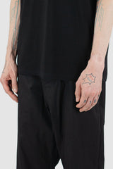 Nomen Nescio - hem view of black standard T-shirt with round neckline, loose fit, for men.