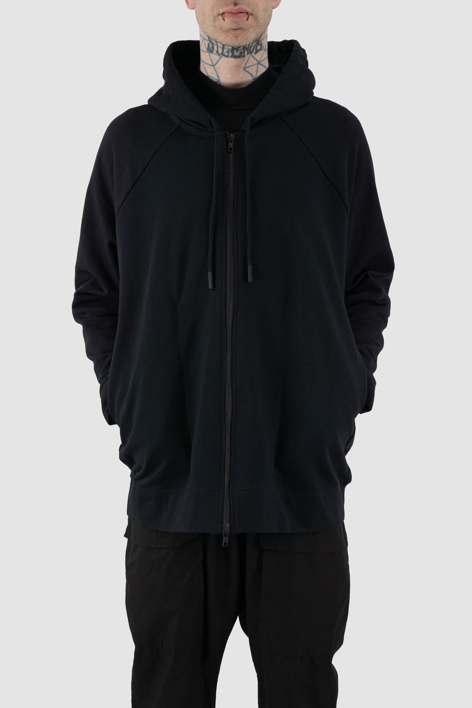 Nomen Nescio - front legere view of black raglan zip hoodie with wool rib cuffs, relaxed fit.