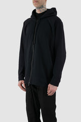 Nomen Nescio - side view of black raglan zip hoodie.