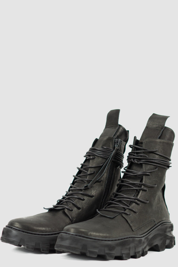 Front  left view of Outdoor Tasker Man High Top Chunky Boot with unique lacing and chunky sole, PURO