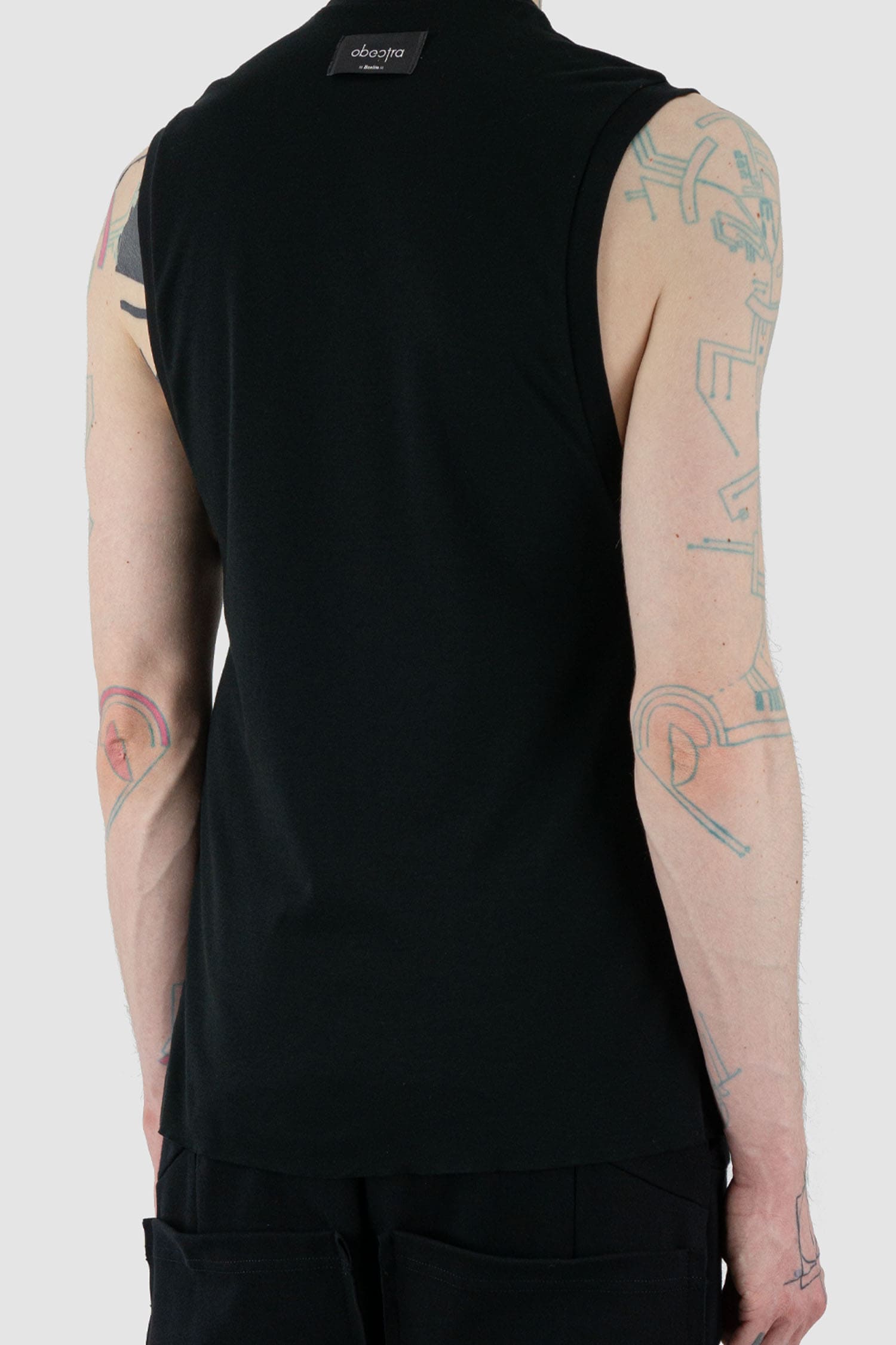 Obectra Studio - Back detail view of Black Cotton Berlin Top with slightly wider arm cut-outs, regular fit, Permanent Collection.