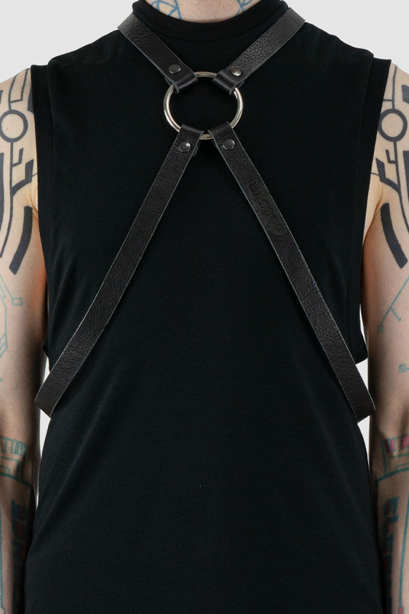 Obectra Studio - Front detail view of black double strap leather harness with adjustable buckles, large metal ring, Permanent Collection.