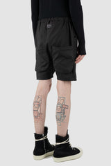 Obectra Studio - Back side view of black Dusk cotton shorts with low crotch, lower positioned back pockets, Permanent Collection.