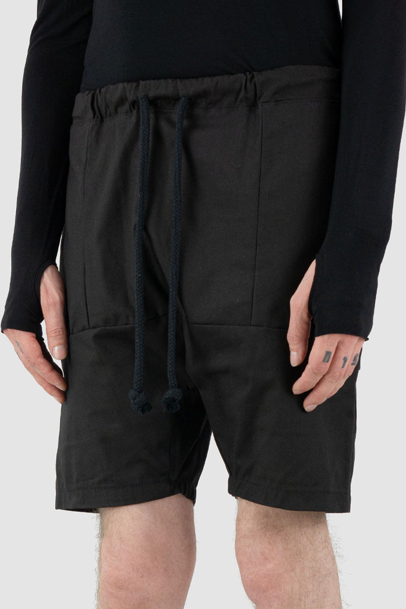 Obectra Studio - Front detail view of black Dusk cotton shorts with low crotch, lower positioned back pockets, Permanent Collection.