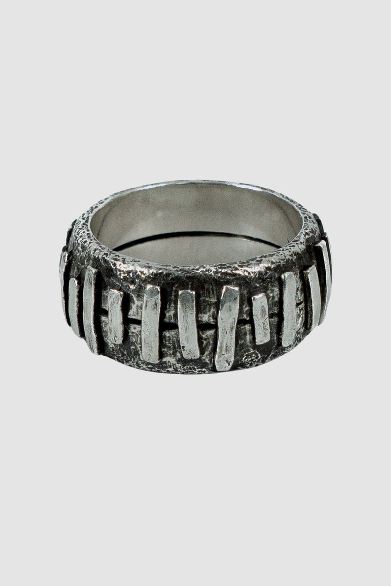 Olivier Jewelry - left view of 925 silver Stitched ring from Permanent collection with irregular silver patches added on 2 rings to combine. 