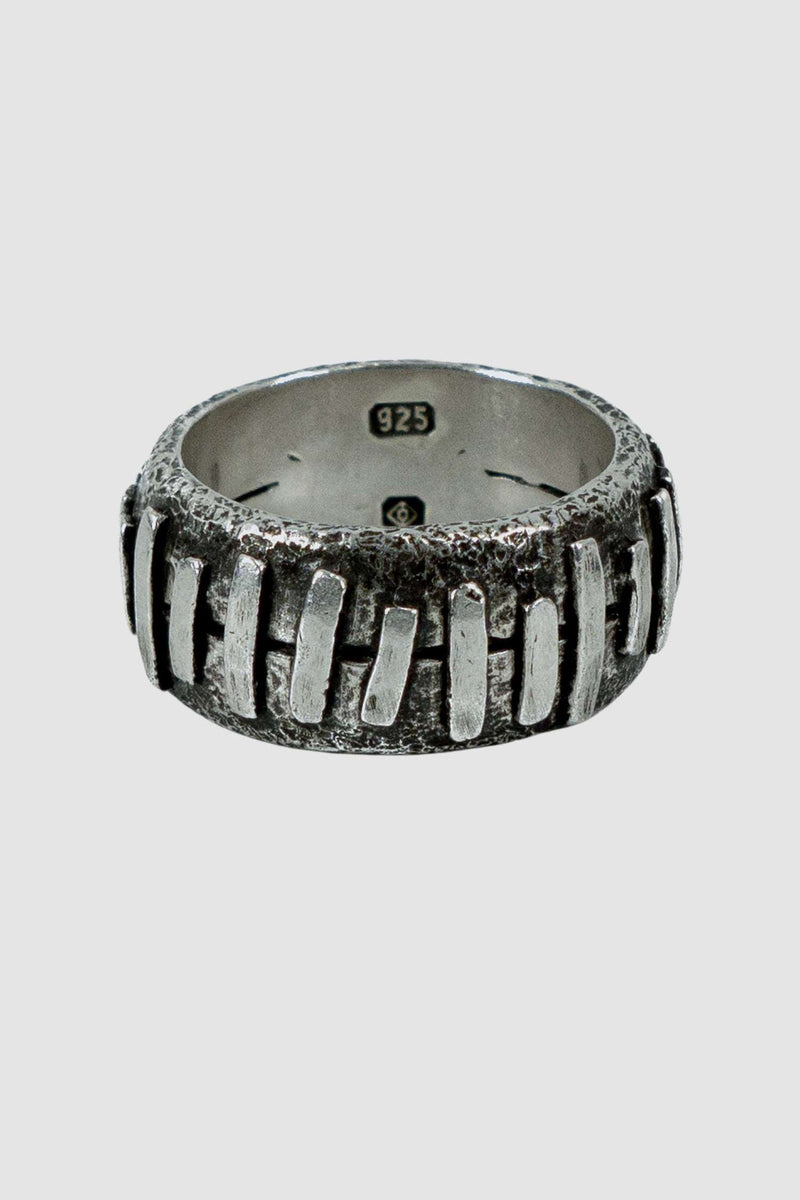 OLIVIER 925 silver Stitched ring from Permanent collection with irregular silver patches added on 2 rings to combine, left view.