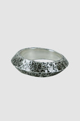 Olivier Jewelry - left view of 925 silver wide tapered ridge ring from the Permanent collection with irregular hammered surface and tapered point.