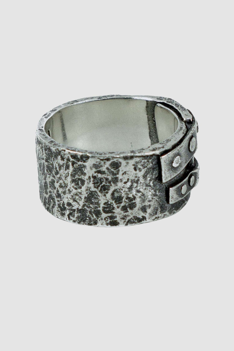 OLIVIER 925 silver blind ring from the Permanent Collection with two additional patches to secure the overlapping ring, left view.