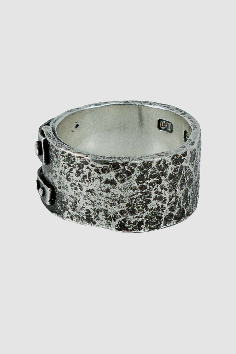 OLIVIER 925 silver blind ring from the Permanent Collection with two additional patches to secure the overlapping ring, right view.