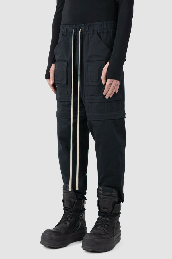 Ovnnie - front side view of the black Convertible Transform Pants.