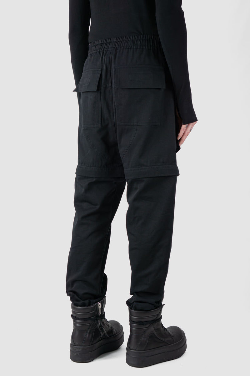 Ovnnie - back side regular view of the black Multifunctional Flared Pants NL12.