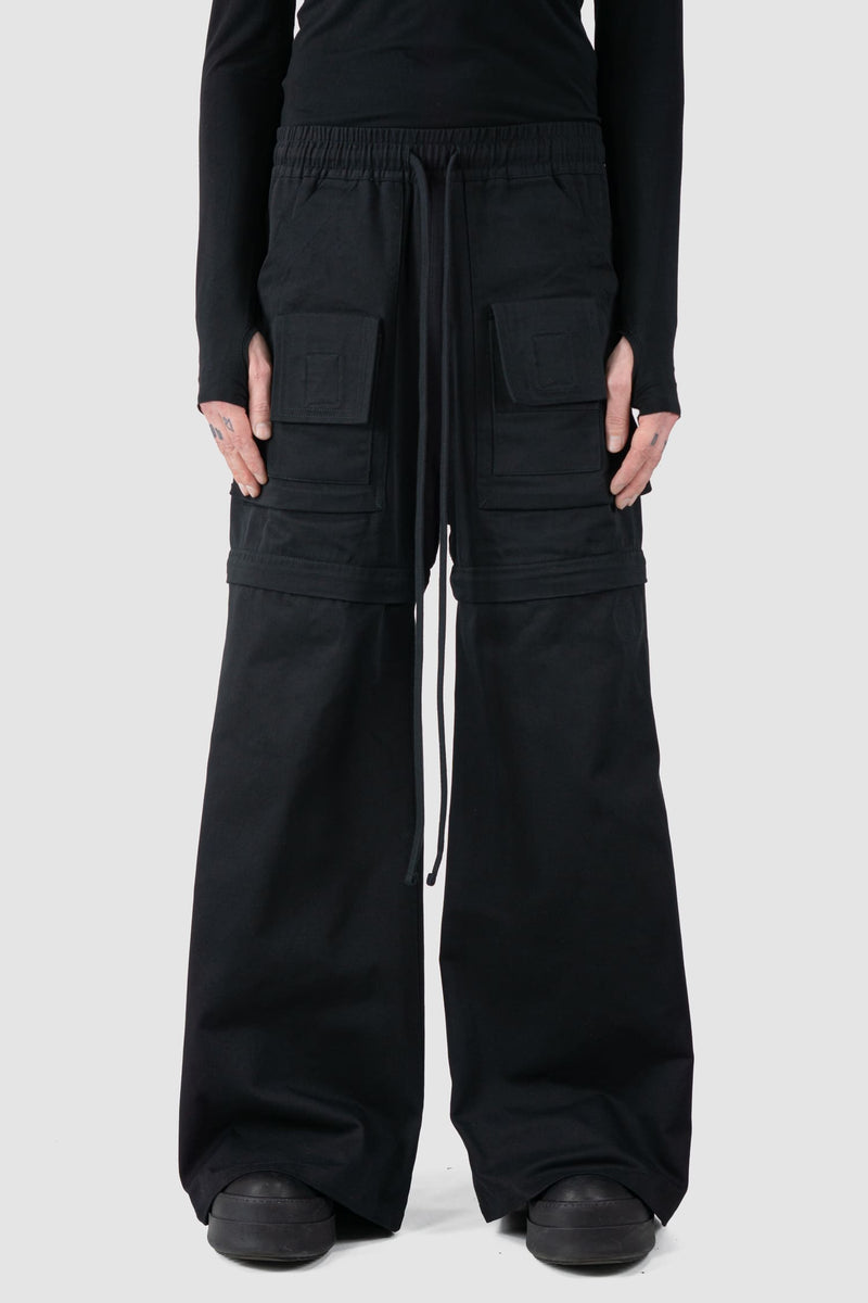 Ovnnie - front view of the black Multifunctional Flared Pants NL12.