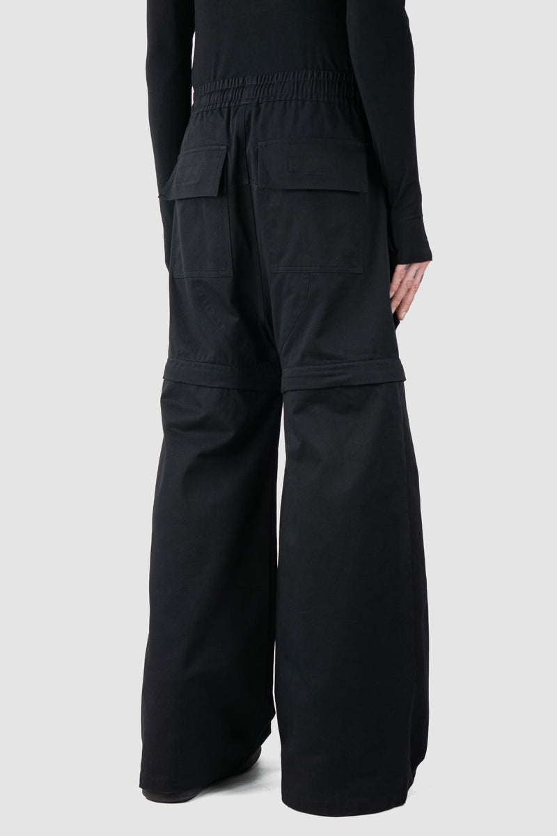 Ovnnie - back side view of the black Multifunctional Flared Pants NL12.