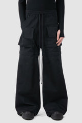 Ovnnie - relaxed view of the black Multifunctional Flared Pants NL12.