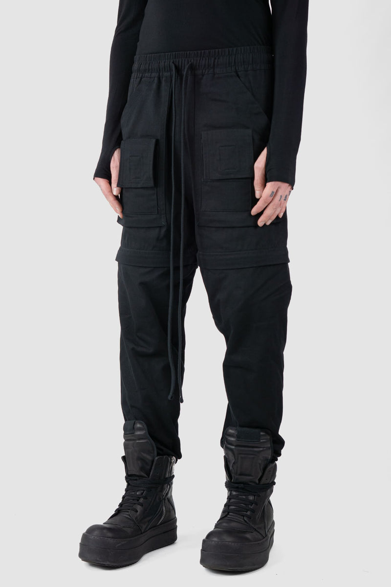 Ovnnie - front side regular view of the black Multifunctional Flared Pants NL12.