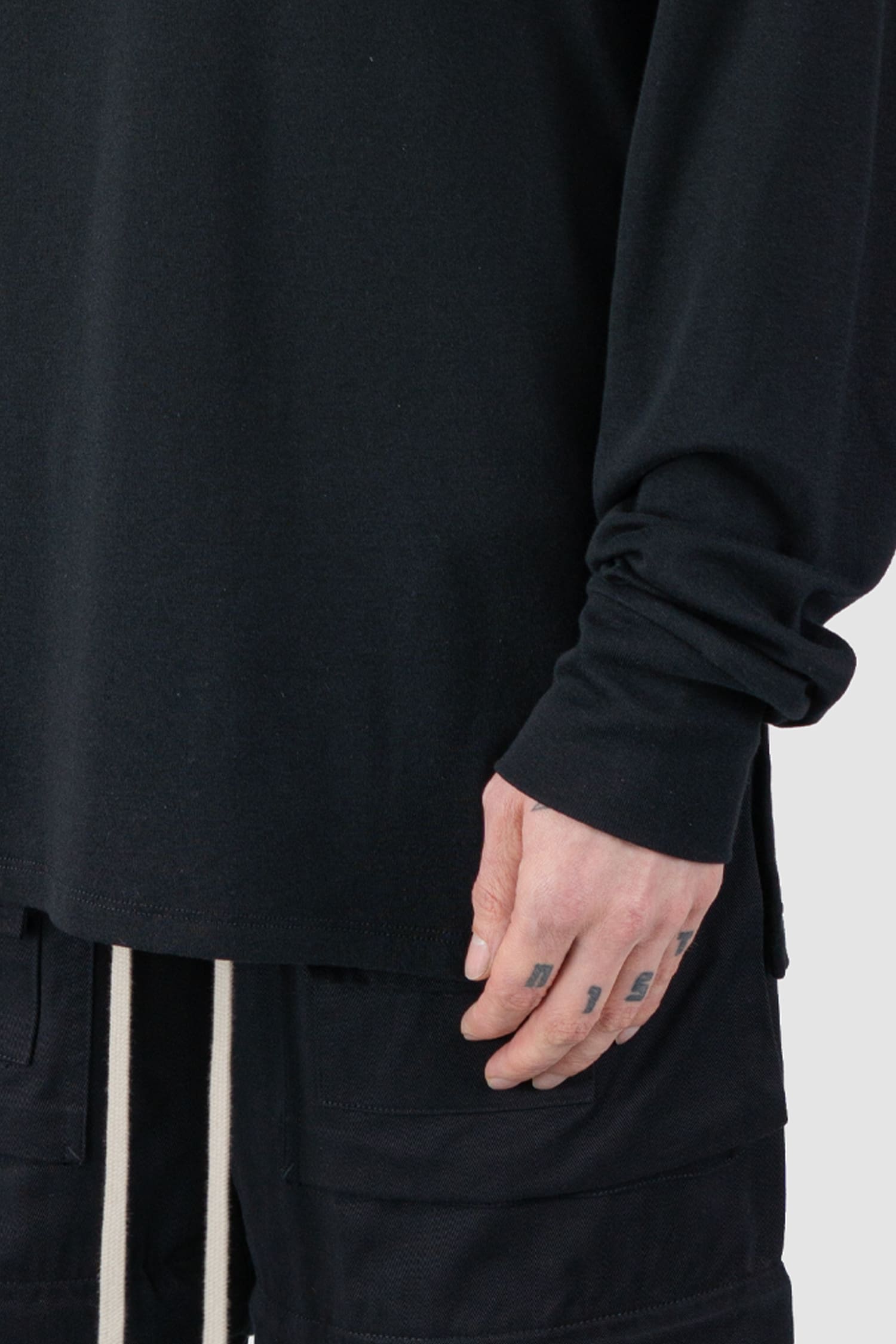 Ovnnie - cuff view of the black Organic Cotton Long Sleeve T-Shirt.