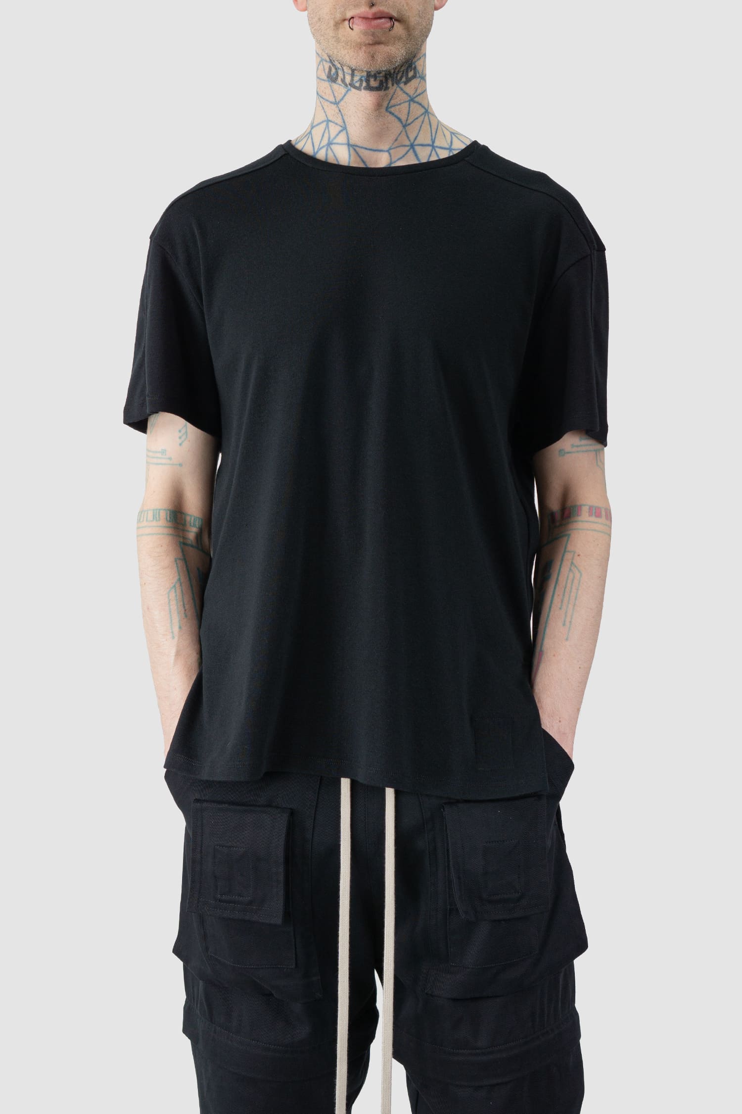 Ovnnie - relaxed view of the black Standard Cotton Basic T-Shirt.