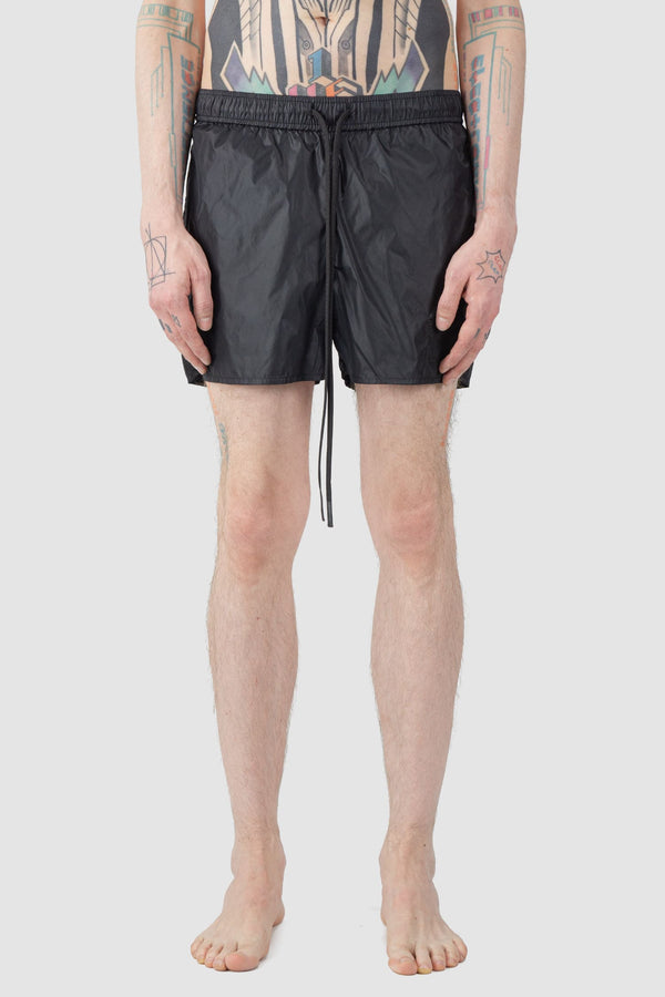 Ovnnie - front view of the black Swim Trunks.