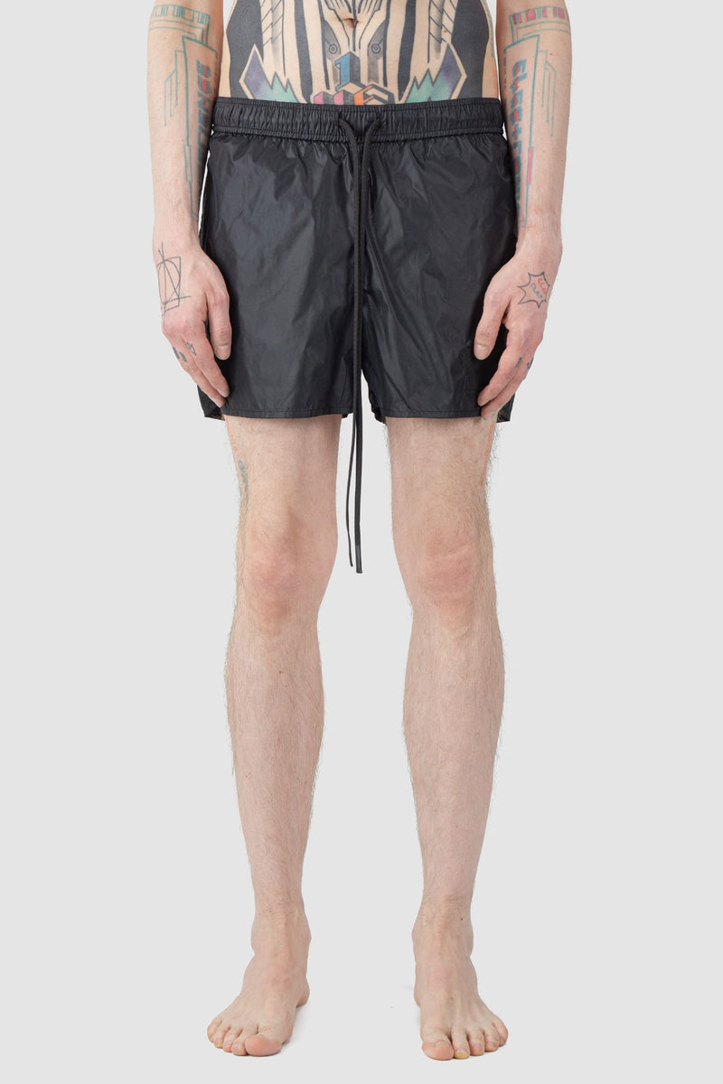 Ovnnie - front view of the black Swim Trunks.