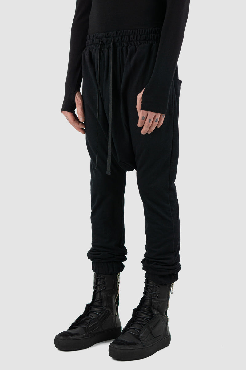 Side view of Black Patty Sweatpants showing elastic waistband, XCONCEPT