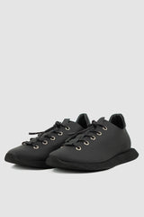 Puro Secret - front left view of matte black leather summer step man sneaker.