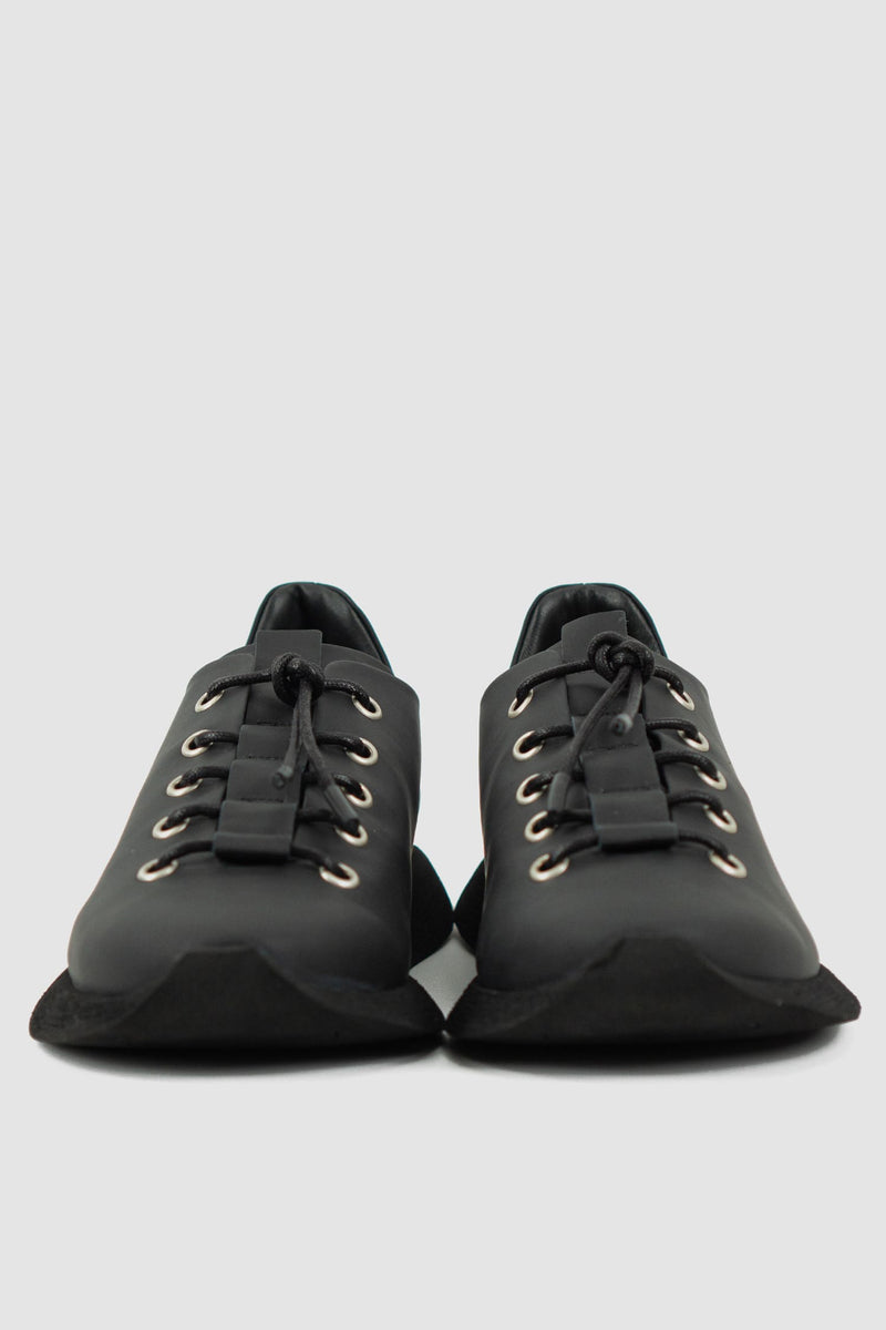 Puro Secret - front view of matte black leather summer step man sneaker for men from the Permanent Collection with parachute laces and a square end sole.