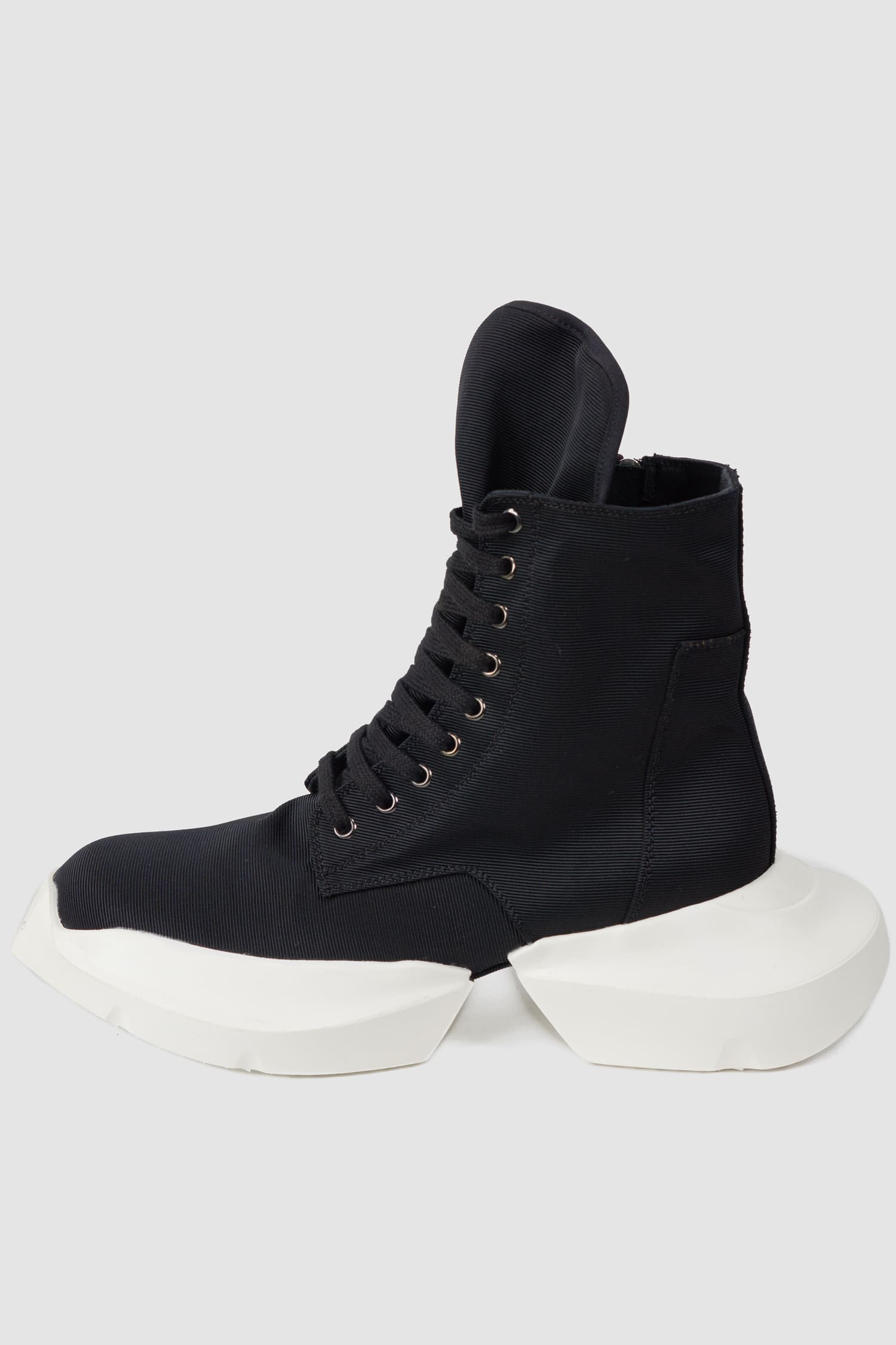 Rick Owens DRKSHDW - left shoe outside of the black Army Split Sole Sneaker.