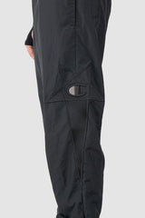 Rick Owens x Champion - pentagram detail view of the black Pentagram Nylon Track Pants.