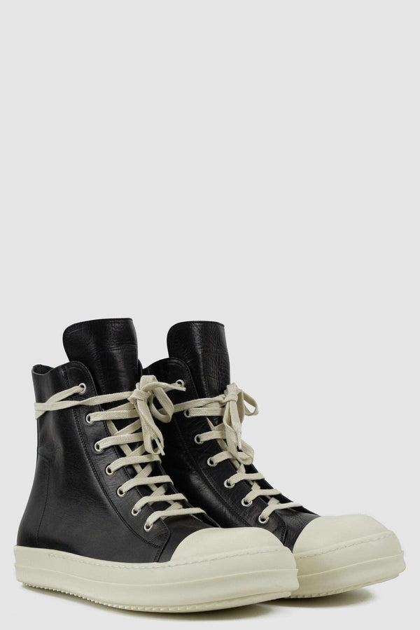 RICK OWENS black Ramones leather sneaker from FW21 featuring a milk white toe cap and an inside zipper front left.