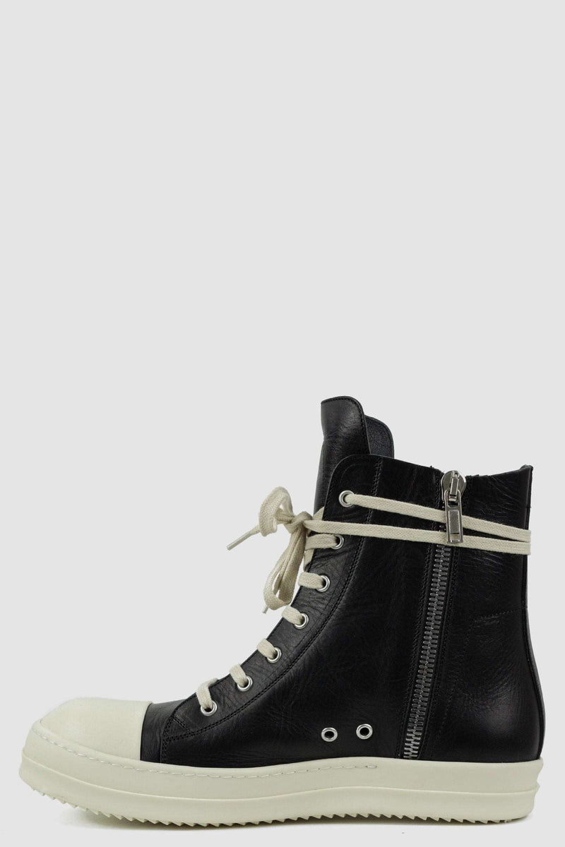 RICK OWENS black Ramones leather sneaker from FW21 featuring a milk white toe cap and an inside zipper left view.