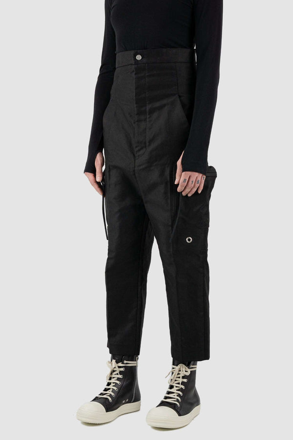 RICK OWENS black high-waisted cargo pants from the FW18 runway, in thick cotton twill with oversized cargo pockets slight right.