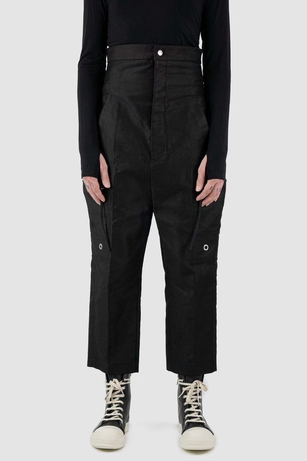 RICK OWENS black high-waisted cargo pants from the FW18 runway, in thick cotton twill with oversized cargo pockets front view.