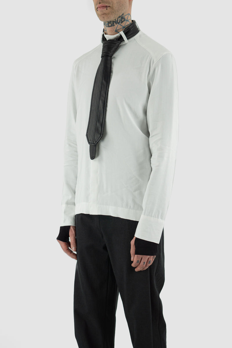 White UY STUDIO Viscose Shirt from FW23 'BACK TO SCHOOL' Collection. Relaxed fit with a stand collar, double-layered cuffs, 93% Viscose, 7% PL. Made in Germany. Model wears size S.