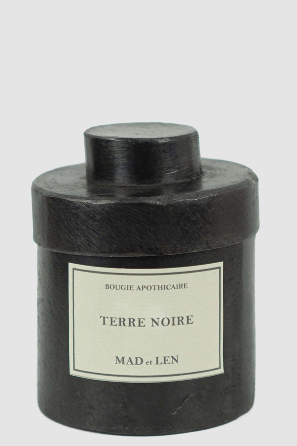 Closed view of Terre Noire Scent Candle in heavy iron vessel, MAD ET LEN