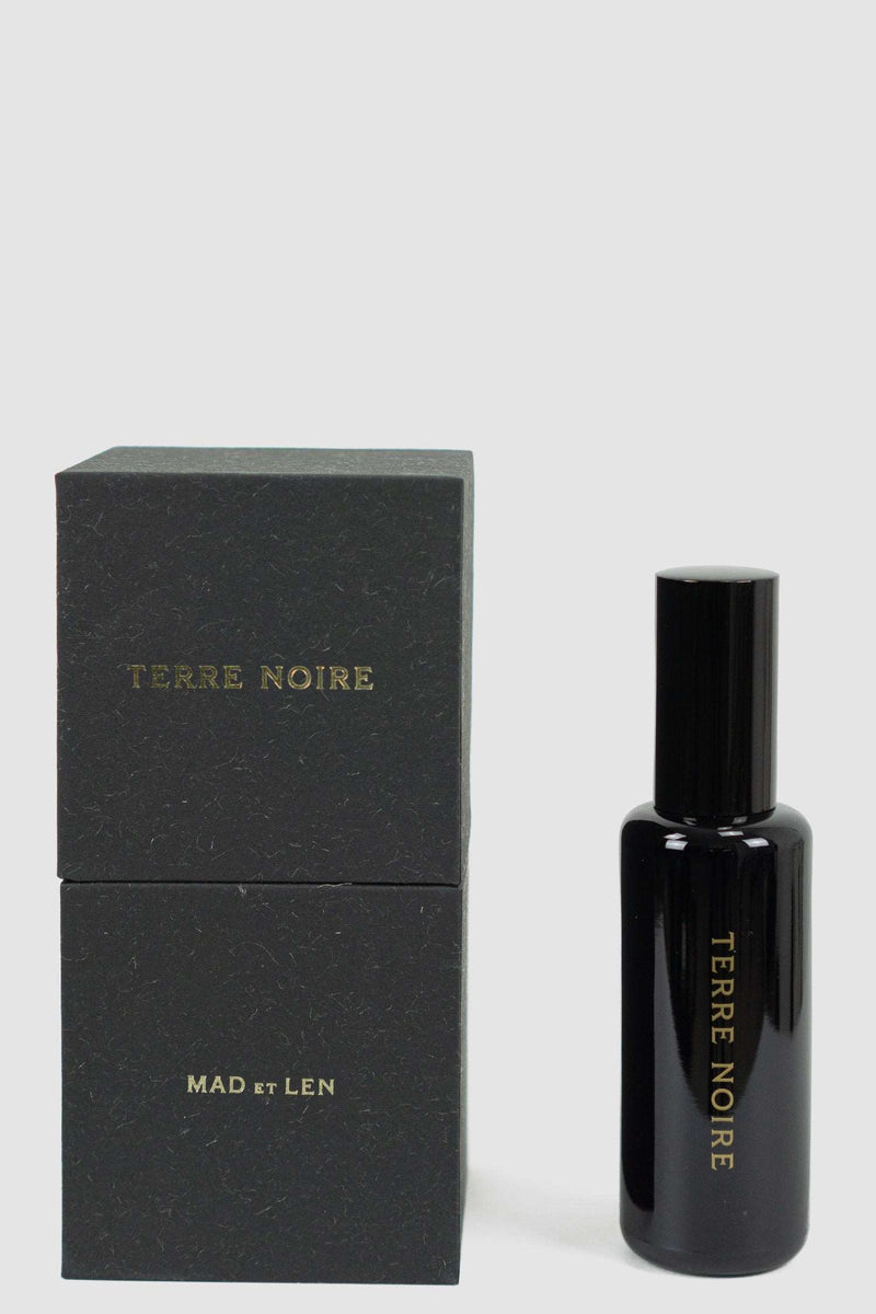 Front view of Terre Noire Eau de Parfum bottle, MAD ET LEN