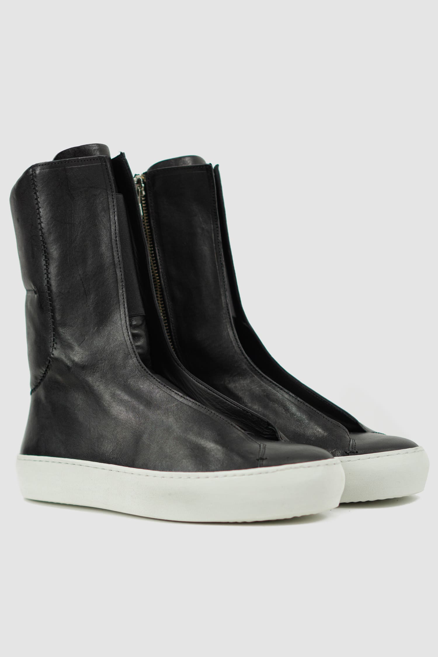 The Last Conspiracy - front right view of Black Leather High Top Sneaker for Men from the Permanent Collection with Contrast Puffed Sole.